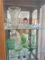 All decorative glass in top 2 shelves