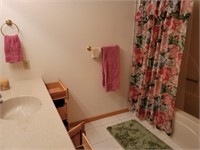 All contents in bathroom (towels, candle, etc)
