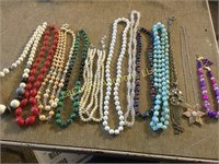 assorted vintage necklaces beads