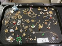 Costume jewelry, pins, earrings.