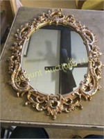 large syroco Gold oval mirror