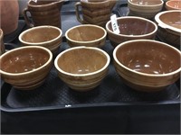 4 USA pottery 5” mixing bowls.
