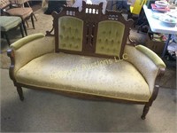Antique settee upholstered ornate wood back