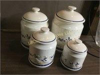 set of 4 goose canisters set good condition