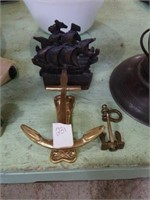 Small metall ship bookends, anchor knocker, and