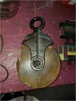 Wood and cast pulley