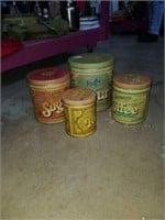 Group of vintage tin storage containers