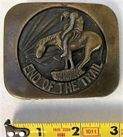 End of the trail belt buckle