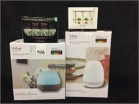 2 FEA  AROMA DIFFUSERS & 2 BOXES AROMA CONCENTRATE