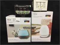 2 FEA  AROMA DIFFUSERS & 2 BOXES AROMA CONCENTRATE