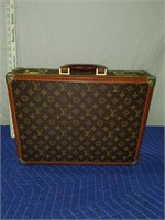 Luis Vuitton briefcase.