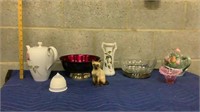 Glass bowl and ceramic decorations