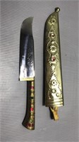 Foreign knife with colored stones and holder