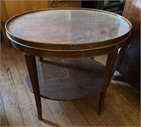 Oval wood table with glass top 18x24x24