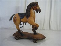 Old 21" wooden horse w/ metal wheels