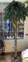 LIGHTED TREE AND SMALL PARROTT