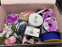 Box of ribbons, stamps, and more
