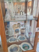 All decorative glass, steins, plates in bottom...