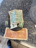 Leather pouch with old stamps and foreign  money