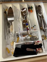 Drawer of serving pieces and glass mixers