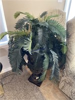 Large floor vase with artificial plant
