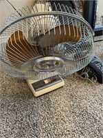Oscillating fan and telephone