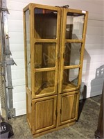 2 door oak finish display cabinet