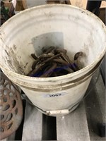 Bucket of horse shoes