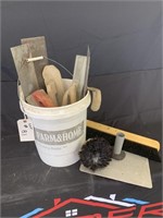 Bucket of Concrete Tools and Concrete Brushes