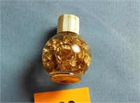 Bottle of Gold Flake in liquid