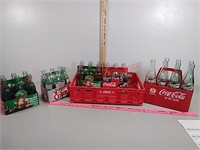 Coca-cola coke bottles and plastic crate