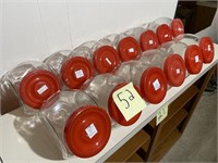 13 GLASS CANDY JARS W/ PLASTIC RED LIDS