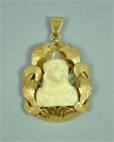 18K MOUNTED CARVED BONE RELIGIOUS PENDANT