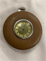 Unusual pocket watch with leather on front and
