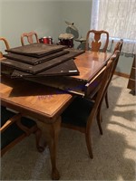 Wood dinning  table w/2 extra leaves, 6 chairs