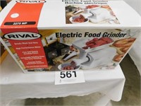 Rival electric food grinder. Used but in original