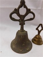 2 small metal bells. 5" tall bell has some age to