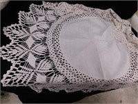 2 round and one square doilies with crocheted