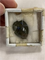 Lapis cabochon about an inch long