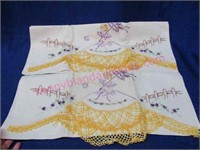 pair of embroidered "lady" pillow cases