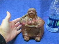 "lady holding fruit" pottery figurine - 5in tall