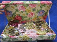 costume jewelry in floral jewelry box
