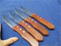(4) oster steak knives