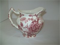 Red floral pitcher