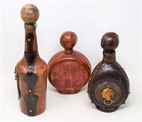 Lot of 3 Leather Covered Bottles