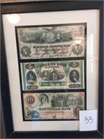 Pair of framed money Prints