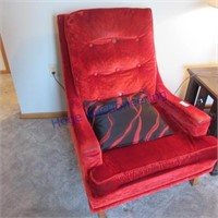 Red chair, wood legs, velour material