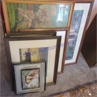 Pile framed pictures