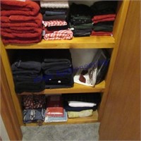 3 shelves- mostly towels, hand towels, wash cloth
