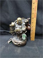 Bronze statue with jade pendants